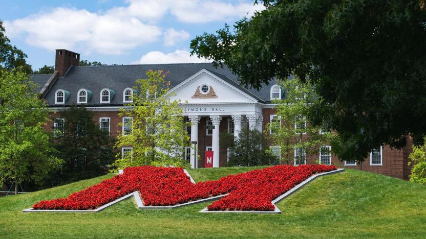 UMD M on grass in front of building